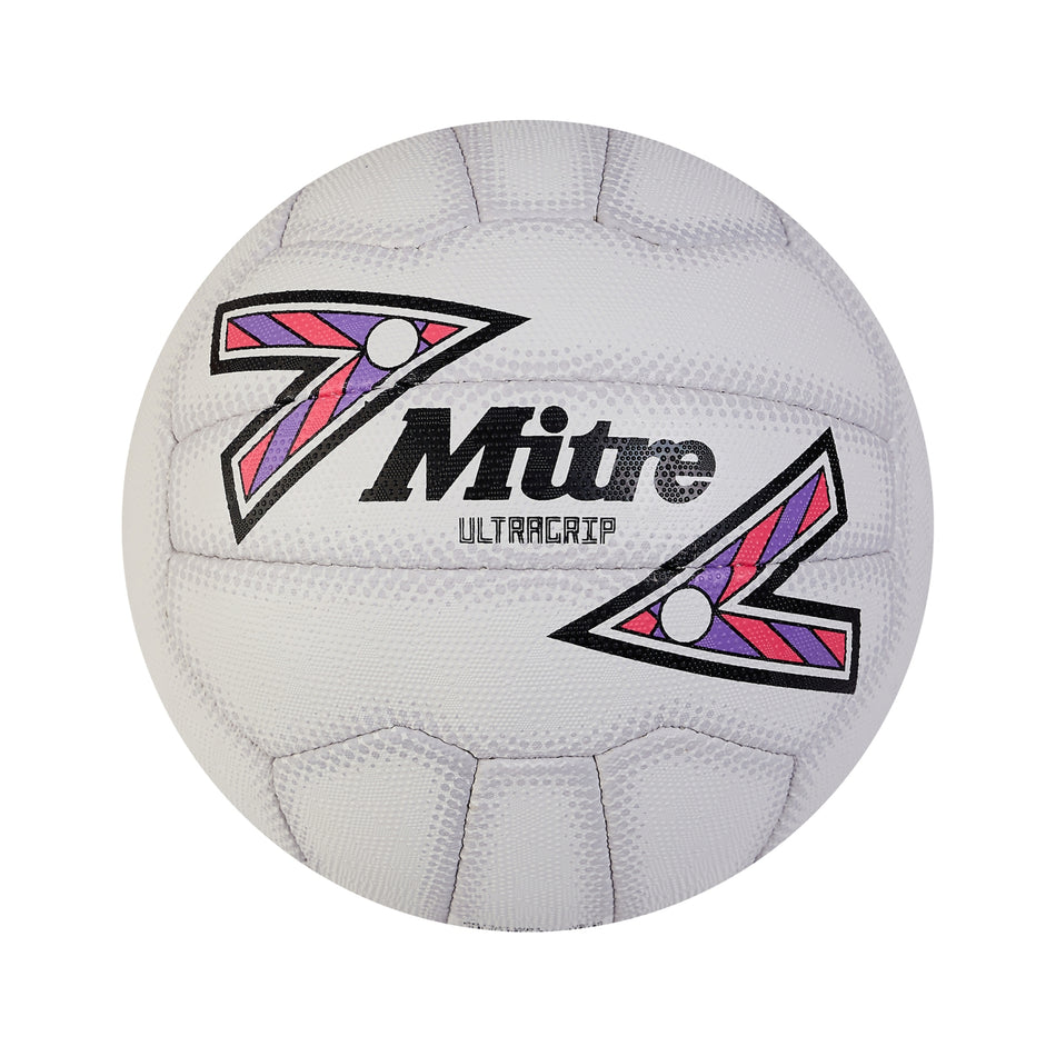 The Mitre Ultragrip Netball, size 4, features a white base with pink, purple, and black geometric designs beside the Mitre logo—ideal for match-level netball play.