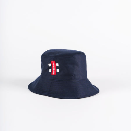 The Gray Nicolls Bucket Hat by Gray Nicolls features a navy design with a red tag and white text on the front, shown against a plain white background.