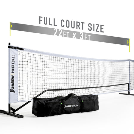 The Franklin Pickleball Official Net, a portable and official size net (22 ft x 3 ft), is displayed with a black carrying bag featuring the Franklin logo. Text above reads: FULL COURT SIZE 22 FT X 3 FT.