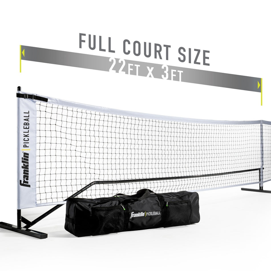 The Franklin Pickleball Official Net, a portable and official size net (22 ft x 3 ft), is displayed with a black carrying bag featuring the Franklin logo. Text above reads: FULL COURT SIZE 22 FT X 3 FT.