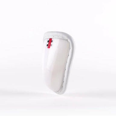 The Gray Nicolls Male Abdo Guard is a white protective sports cup featuring a padded rim and a small red and black Gray Nicolls label at the top, photographed against a plain white background.