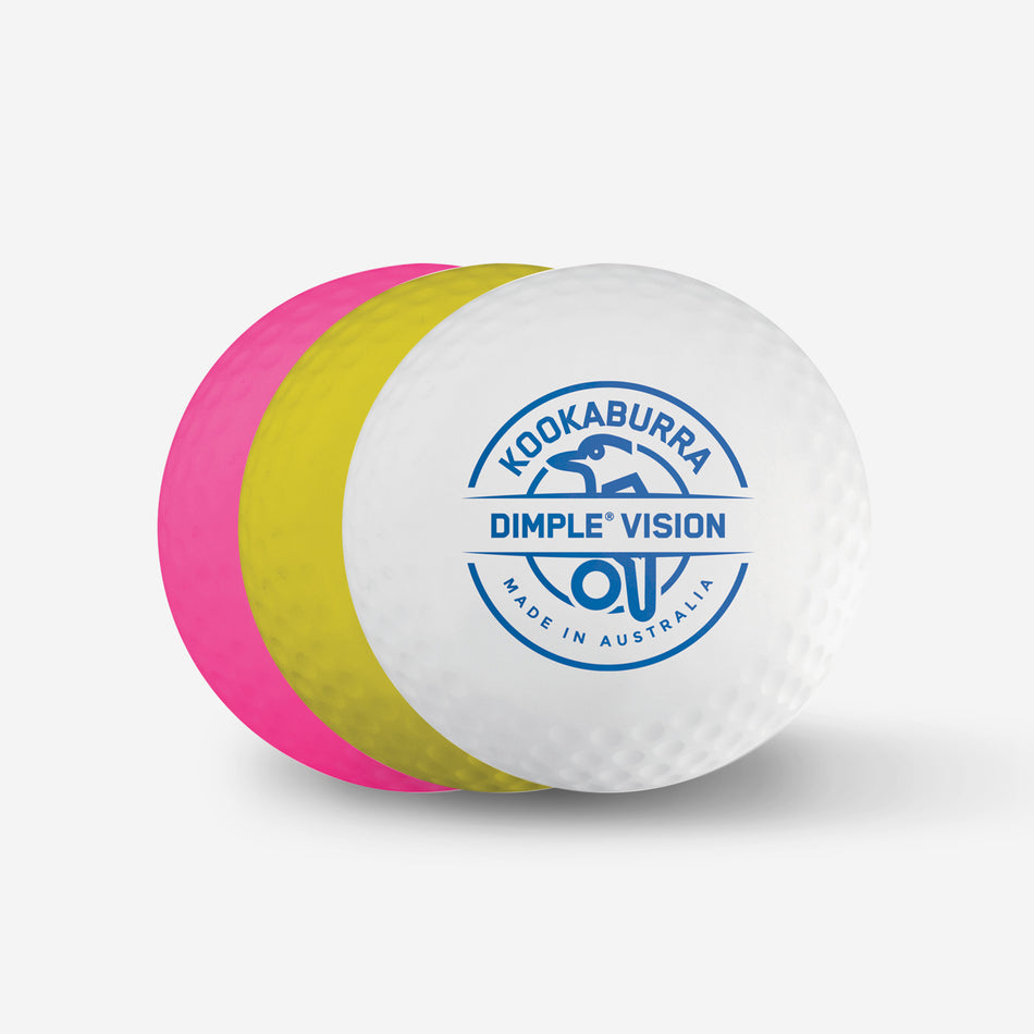 Three Kookaburra Dimple Vision Hockey Balls—white (with blue branding), yellow, and pink—are lined up on a plain white background, highlighting the popular Kookaburra product made in Australia.