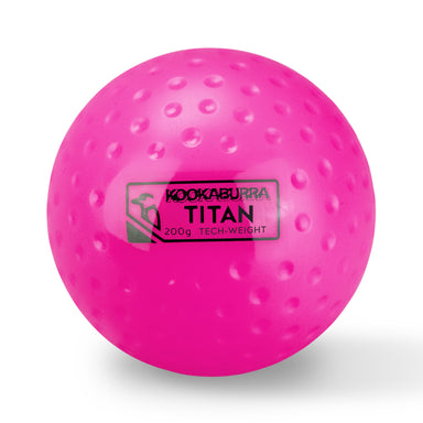A bright pink Kookaburra Dimple Titan Hockey Ball, designed to boost passing strength and 3D skills for sports training, is displayed on a white background.