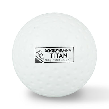 A white Kookaburra Dimple Titan Hockey Ball, featuring a bird logo and dimpled surface, is shown against a plain background—perfect for improving passing strength.