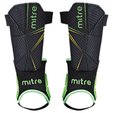 The Mitre Delta Ankle Shinguard features a black design with green and yellow accents, a textured surface, and black ankle supports with green trim for added protection; available in kids’ and men's sizes.