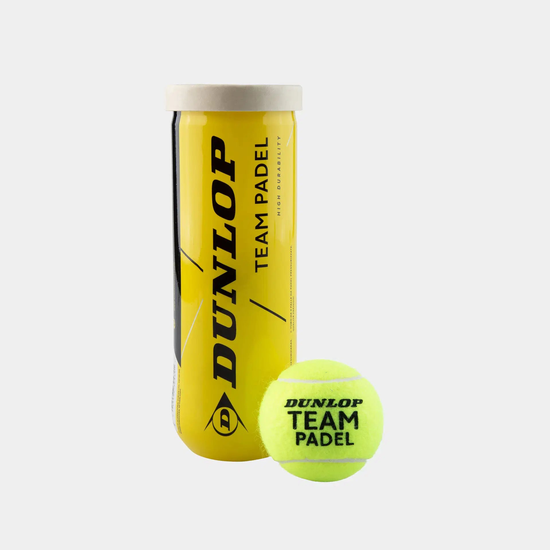 A tube of Dunlop Team Padel Balls - 3 Ball Tube, featuring yellow balls and black text, stands next to a single bright yellow padel ball on a white background. Brand: Dunlop.