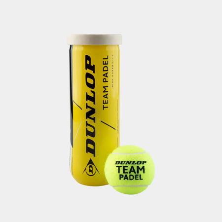 A tube of Dunlop Team Padel Balls - 3 Ball Tube, featuring yellow balls and black text, stands next to a single bright yellow padel ball on a white background. Brand: Dunlop.