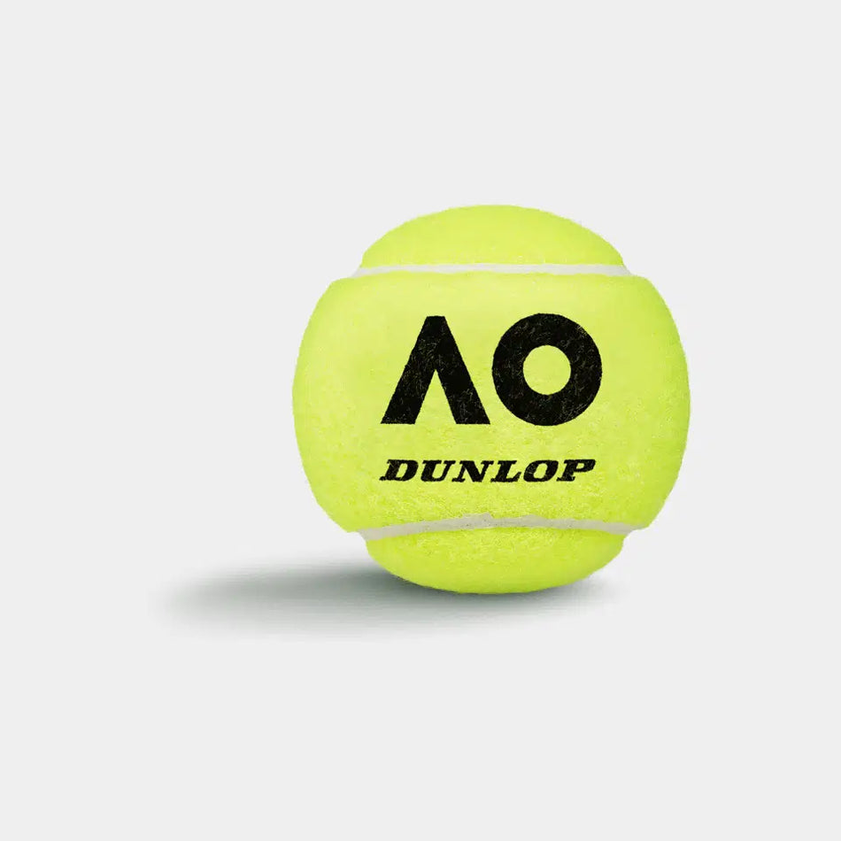 A bright yellow Dunlop Australian Open Tennis Ball from a 4 Ball Tube, featuring the black AO logo and DUNLOP text, casts a faint shadow on a white background—engineered for Grand Slam performance.