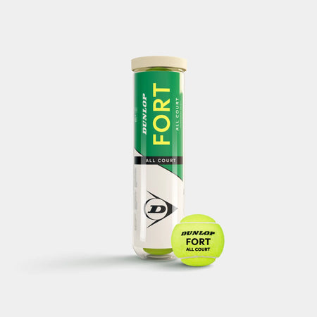A tube of Dunlop Fort All Court Tennis Balls (4 Ball Tube) by Dunlop is upright, displaying its green, white, and black label; one yellow ball in front highlights the elite-level Dunlop Fort All Court branding for any surface.