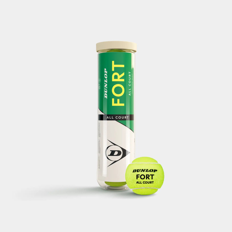 A tube of Dunlop Fort All Court Tennis Balls (4 Ball Tube) by Dunlop is upright, displaying its green, white, and black label; one yellow ball in front highlights the elite-level Dunlop Fort All Court branding for any surface.