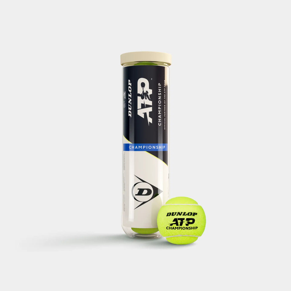 A tube of Dunlop ATP Championship Tennis Balls (4 Ball Tube) stands upright beside a yellow ball, both displaying the Dunlop logo, on a plain background—official ATP quality for every match.