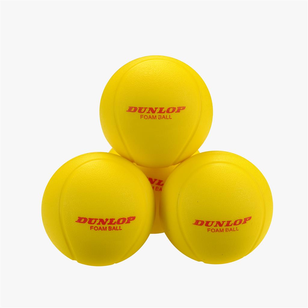A set of Dunlop Training Foam Tennis Balls (12 Pack) is shown stacked on a white background, ideal for introducing kids to tennis. The bright yellow balls feature "DUNLOP FOAM BALL" printed in red.