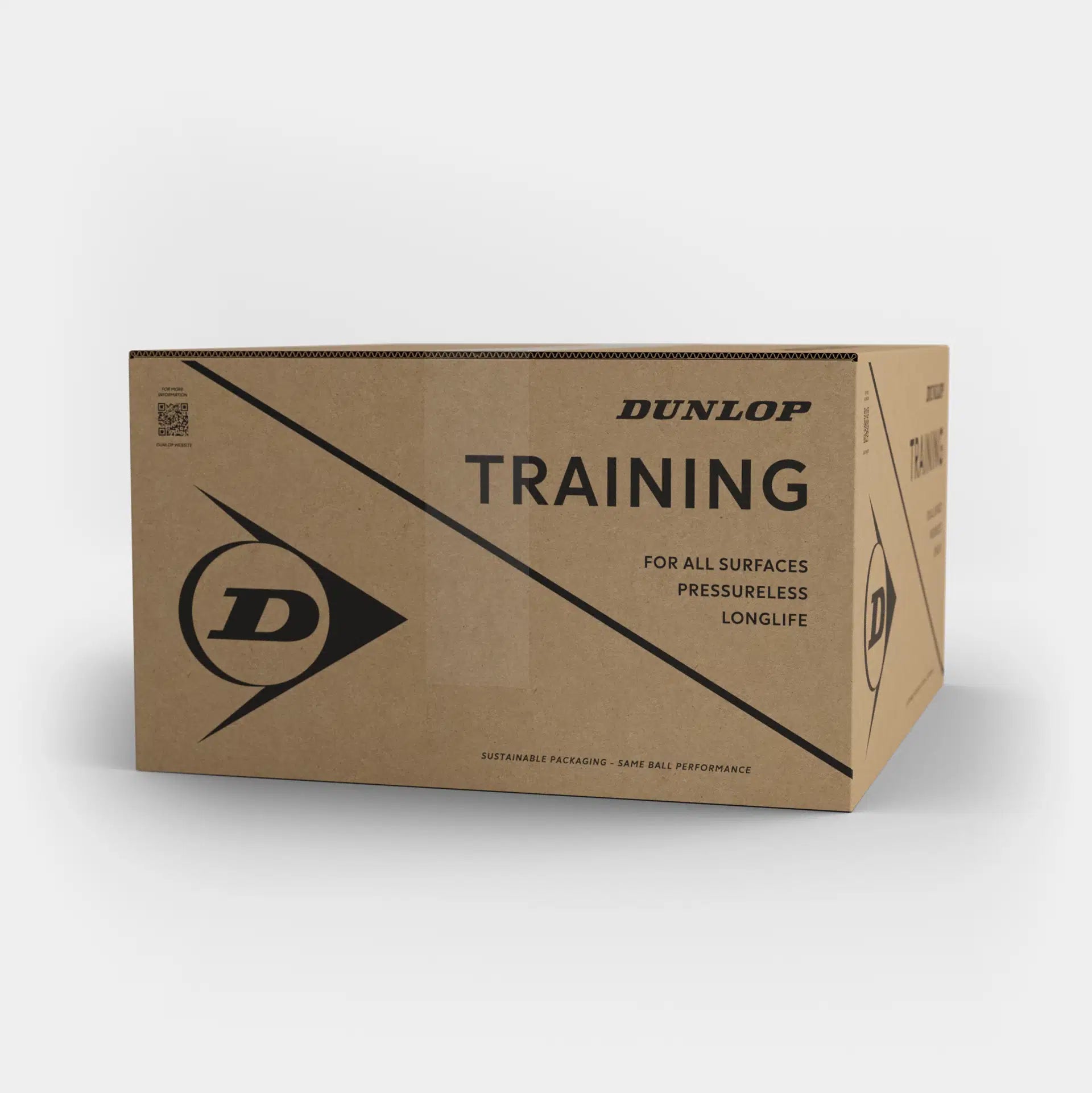 A brown Dunlop cardboard box labeled “TRAINING” contains Dunlop Trainer Tennis Balls (6 Dozen Box), pressureless for durability on all surfaces. Features the Dunlop logo and sustainable packaging text, set against a white background.