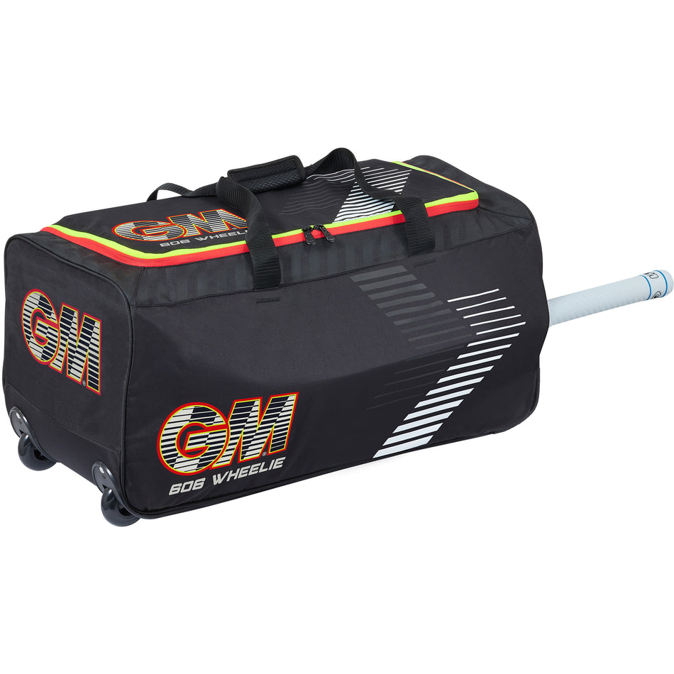 The Gunn & Moore 606 Wheelie 2026 is a large black cricket bag with durable wheels, side handles, and a bat sleeve showing part of a cricket bat. It features bold Gunn & Moore branding and diagonal stripes for a sporty look.