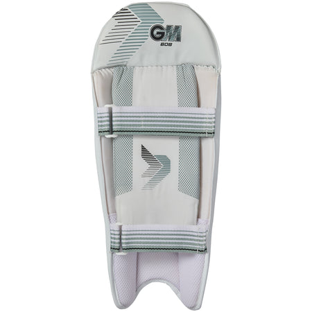 The Gunn & Moore 606 Wicket Keeping Pads 2026 feature white and grey padded sections, two adjustable straps, the GM logo at the top, and are lightweight for comfort and a secure fit.