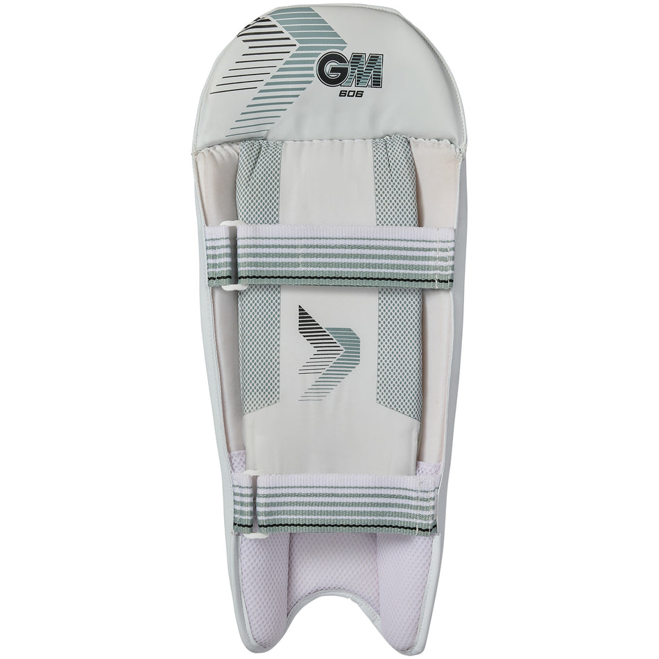 The Gunn & Moore 606 Wicket Keeping Pads 2026 feature white and grey padded sections, two adjustable straps, the GM logo at the top, and are lightweight for comfort and a secure fit.