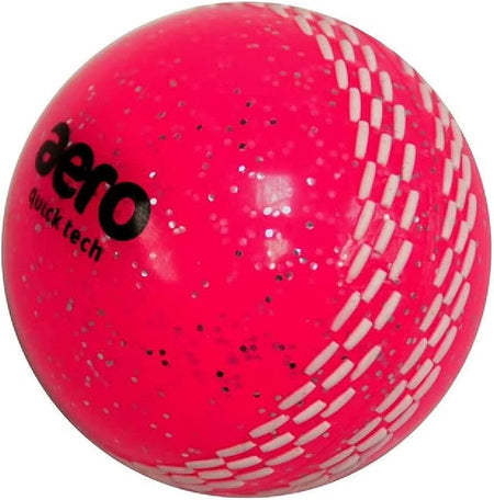 The Aero Quick Tech Glitter Junior Windball by Aero is a bright pink windball with white stitching, silver speckles, and the black aero logo—ideal as a coaching cricket ball for young players.