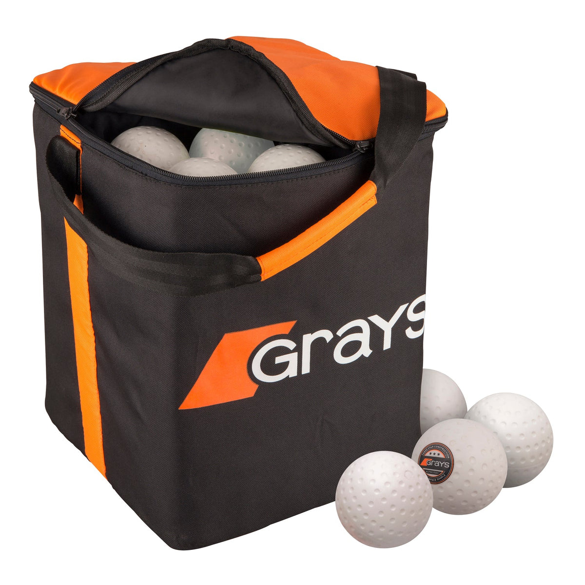 The Grays Hockey Ball Bag by Grays, shown in black and orange with a sturdy handle, is filled with white field hockey balls, with some balls also displayed outside the bag.