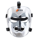 The Grays Hockey Facemask by Grays features a clear polycarbonate shell, black straps, and an orange and black Grays logo at the top, designed for sports safety and short corner protection.