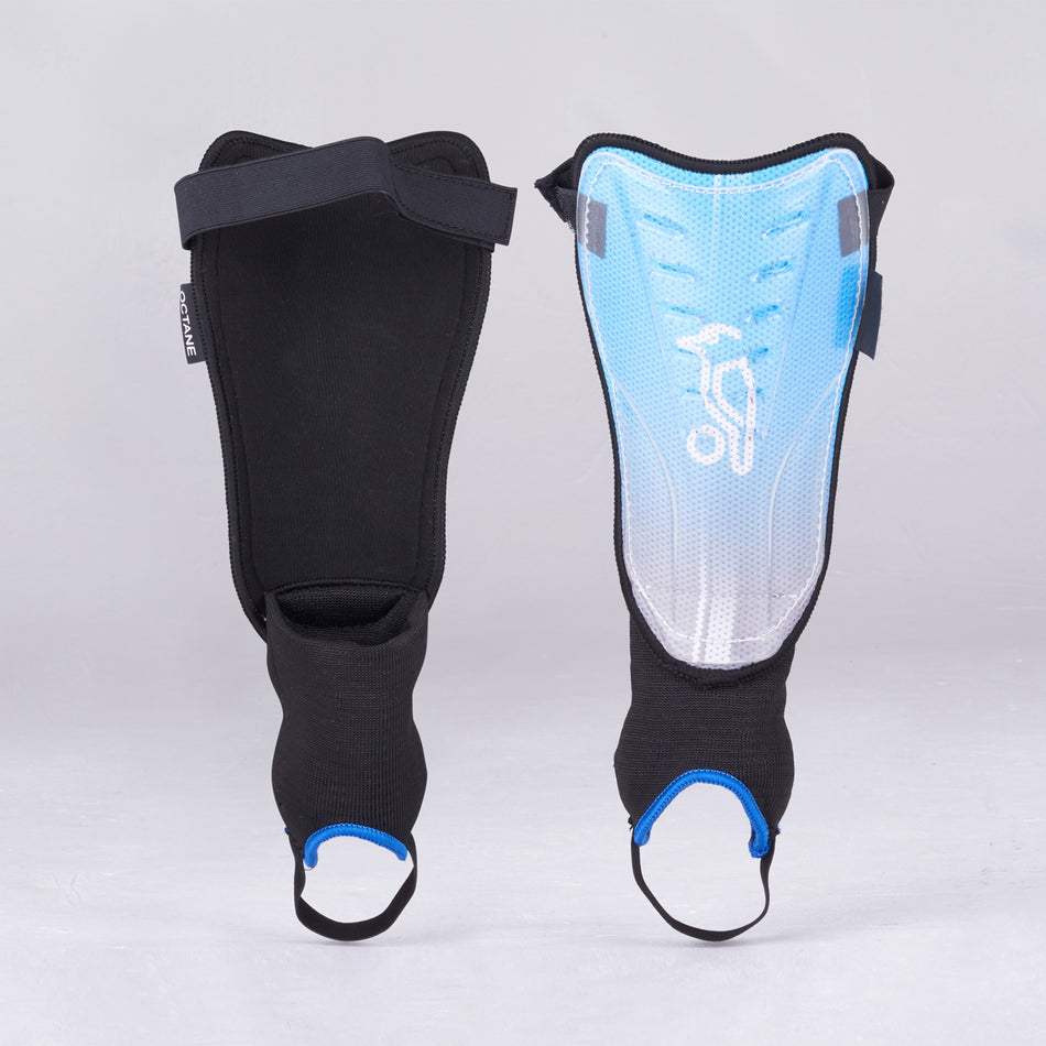 Two blue Kookaburra Octane Shinguards with foot straps stand upright against a plain gray background, displaying both front and back. These Kookaburra shinguards offer multi-purpose protection with added ankle disc safety features.