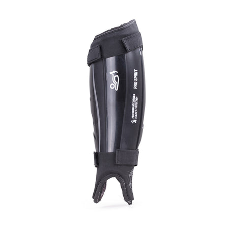 The Kookaburra Pro Spirit Shinguards by Kookaburra feature a black protective shell, adjustable straps, and white branding, shown upright on a white background—designed for sports protection.