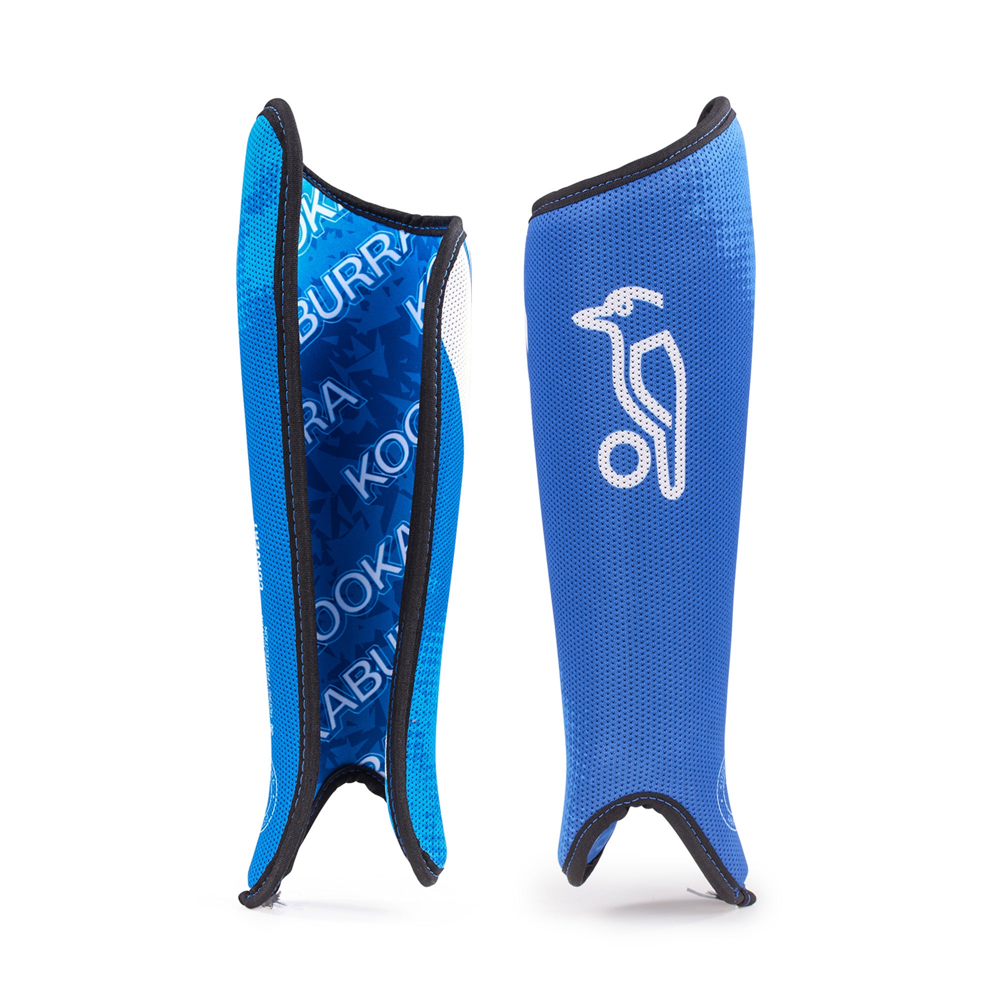 Two blue Kookaburra Convert Shinguards 2026 are shown upright—one features a white bird logo, while the other reveals a blue PVC ergonomic interior with "KOOKABURRA" in white text.