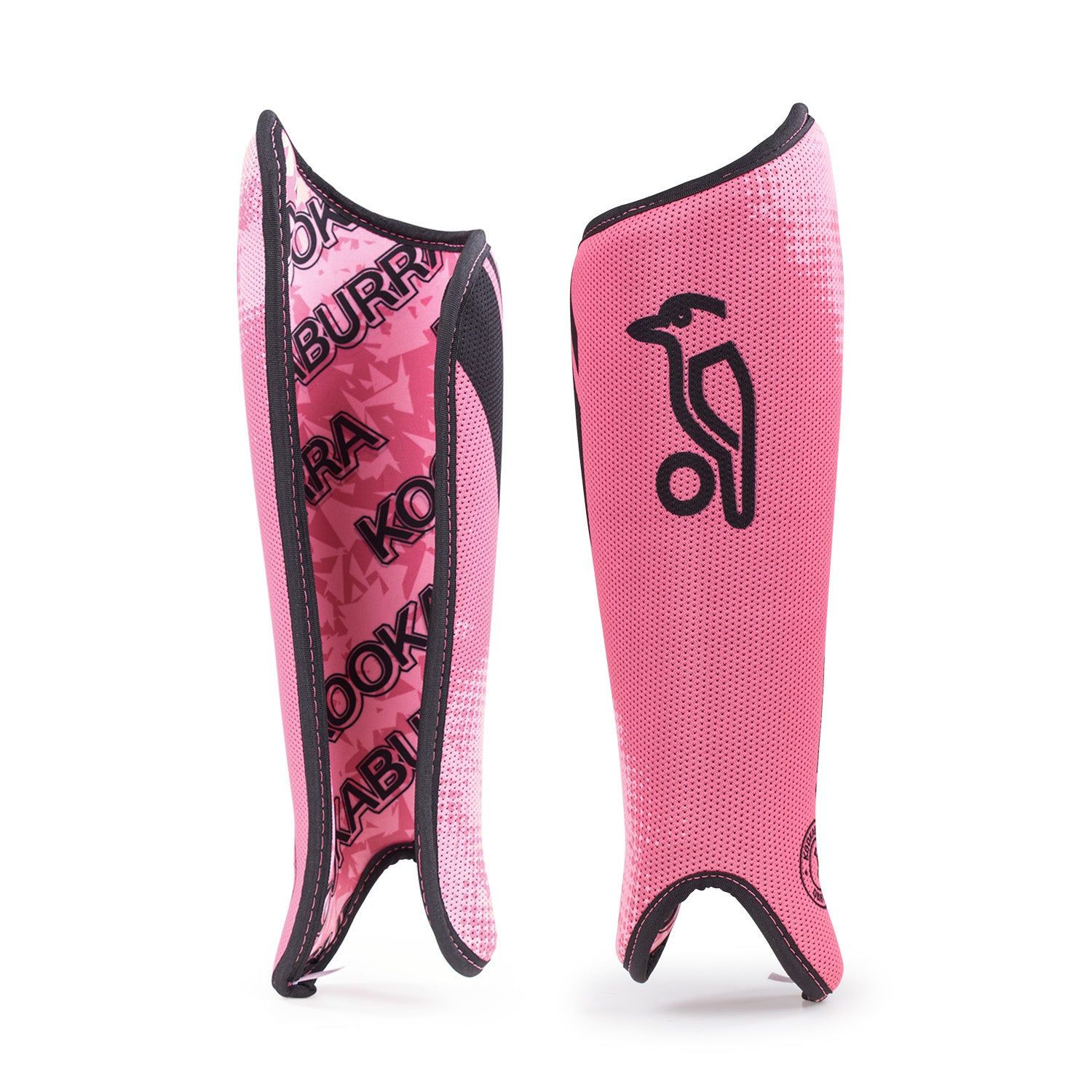 The Kookaburra Convert Shinguards in pink feature black accents, a bird logo on one guard, and bold KOOKABURRA lettering on the other. Made from sublimated fabric, they provide comfort and style for every game.