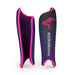 Two Kookaburra Convert Shinguards 2026 in purple/pink stand upright, displaying the brand name and logo. Their ergonomic PVC build and vibrant pink inner lining with repeating Kookaburra branding are visible.