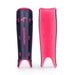 Two purple and pink Kookaburra Edge Shinguard 2026 shin guards are shown: one displays the front with the Kookaburra logo and branding, while the other shows the plain pink foam backing inside.