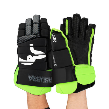 A pair of hands wear Kookaburra Pro Conflict Hockey Gloves by Kookaburra in black and neon green, featuring reinforced fingers, wrist support, visible logos, a rubberised palm for grip, and high-density foam padding for flexibility and safety.
