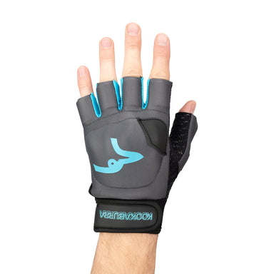 A hand wearing a Kookaburra Pro Spirit Hockey Glove by Kookaburra, featuring a gray and black fingerless flex system design with blue accents, a blue logo on the back, wrist strap, and exposed fingertips for comfortable active use.