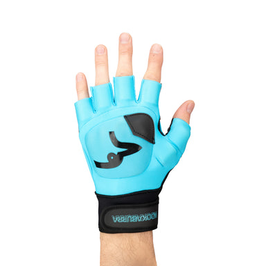 A hand wears the Kookaburra Spirit LH Hockey Glove by Kookaburra in blue, a fingerless sports glove with black accents and an open palm for better stick control, palm facing forward against a white background.