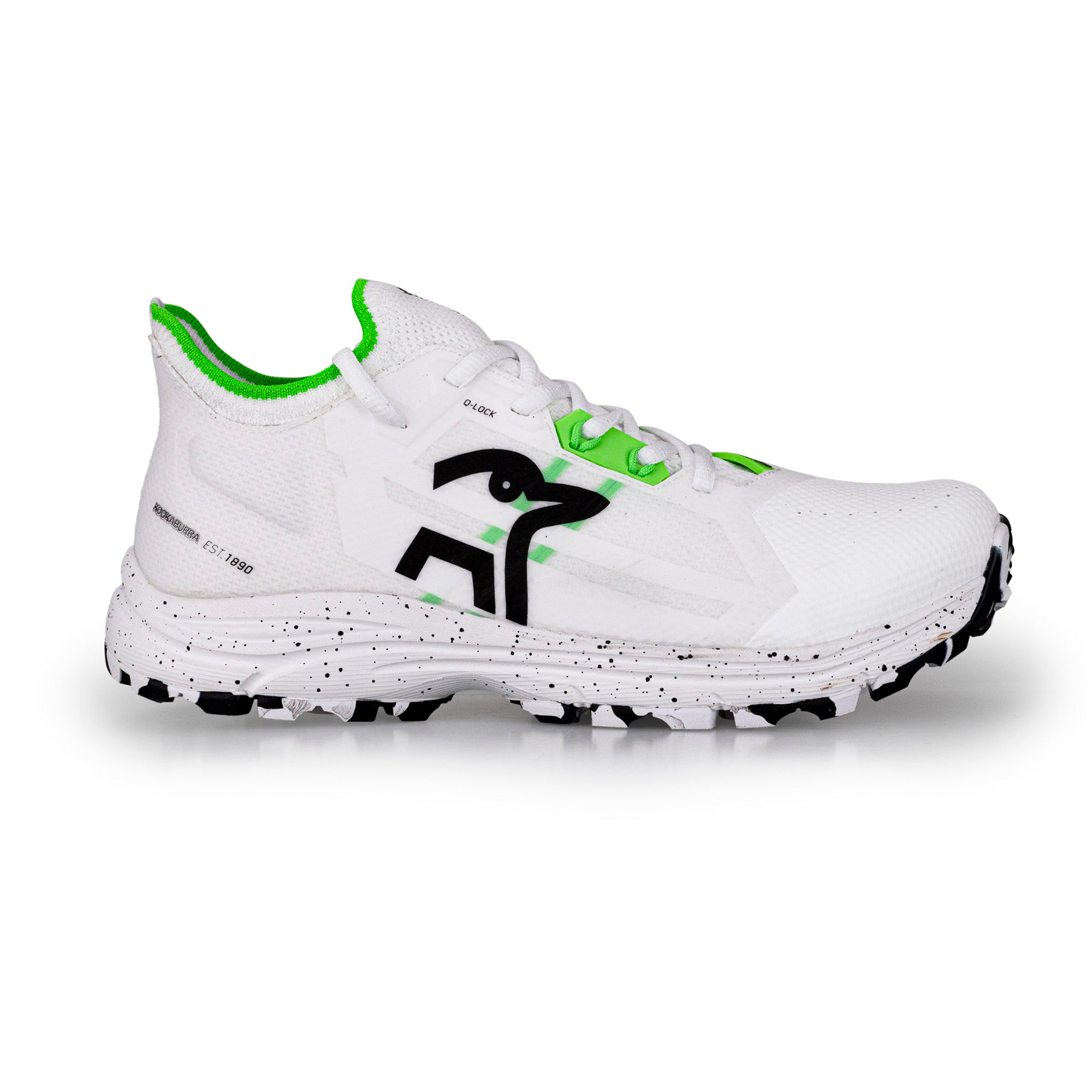 The Kookaburra Vapor Hockey Shoes by Kookaburra feature a white design with black and neon green accents, a thick speckled sole, advanced traction outsole, and a bold logo—ideal for anyone wanting premium hockey shoes.