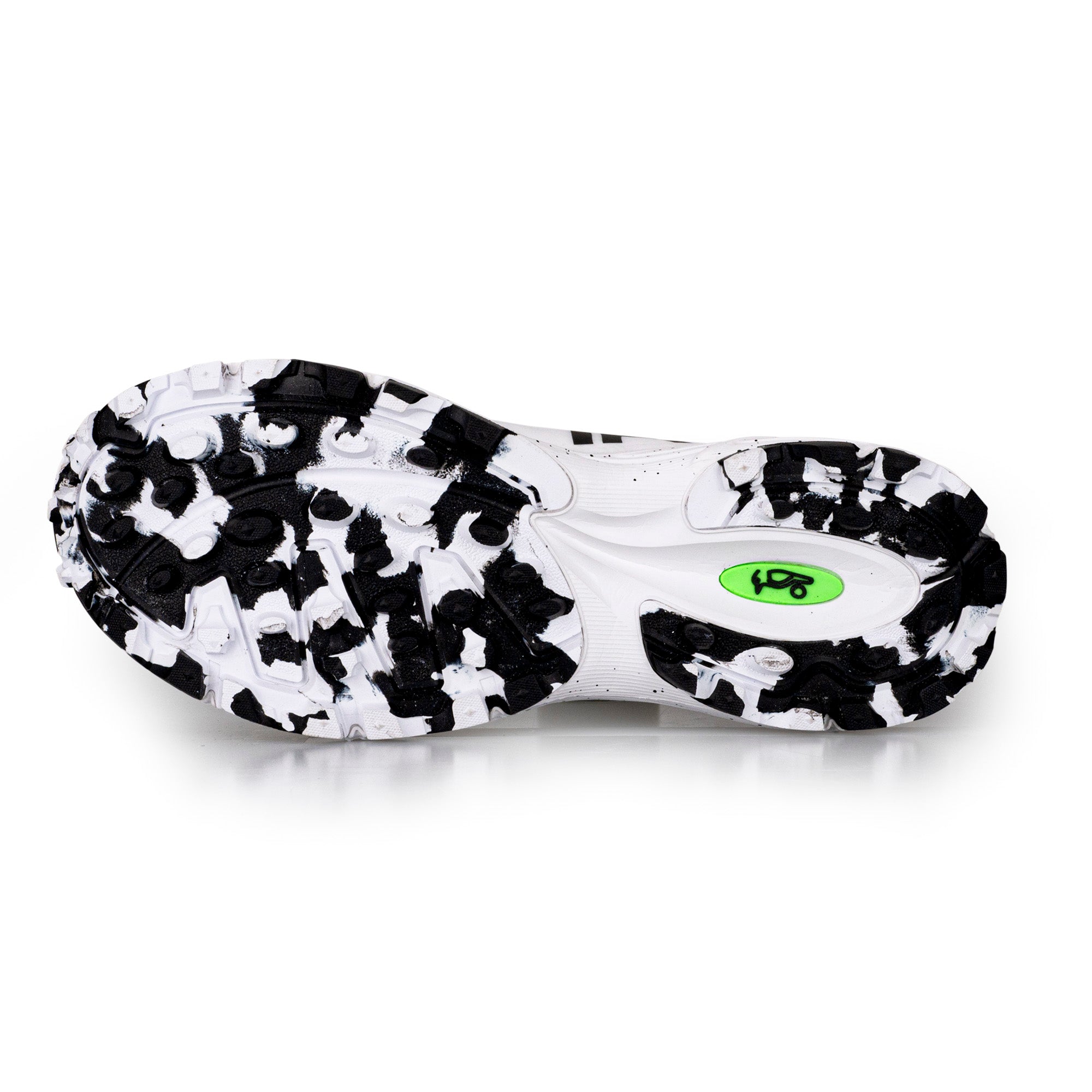 The image displays the sole of Kookaburra Vapor Hockey Shoes by Kookaburra, showcasing a black and white marbled tread, an advanced traction outsole, and a small green oval detail near the midfoot.