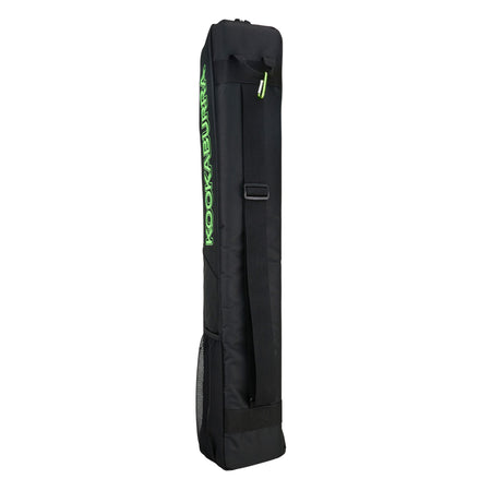 The Kookaburra Vex Hockey Kitbag 2025 is a black rectangular bag with a padded shoulder strap, zippered opening, mesh bottom pocket, and large top pocket. "KOOKABURRA" appears in green on the side; also ideal for carrying hockey sticks.