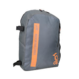 The Kookaburra Orbit Hockey Rucksack 2025 is a grey junior bag with black adjustable straps, an orange Kookaburra logo and label on the front, and a zippered front pocket.