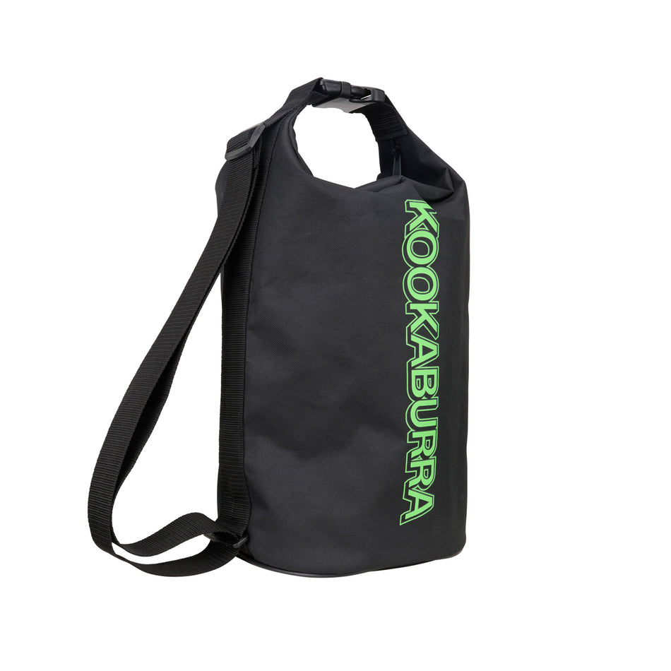 The Kookaburra Pro Holdball is a black sports bag with a roll-top closure, adjustable shoulder strap, and KOOKABURRA in green on the front—perfect for carrying cricket or hockey balls.