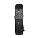 The Kookaburra Axis Hockey Kit Bag 2026 by Kookaburra in grey stands upright and features zippered compartments, a padded shoulder strap for comfort, bungee cord detail on the front, and a small side handle.