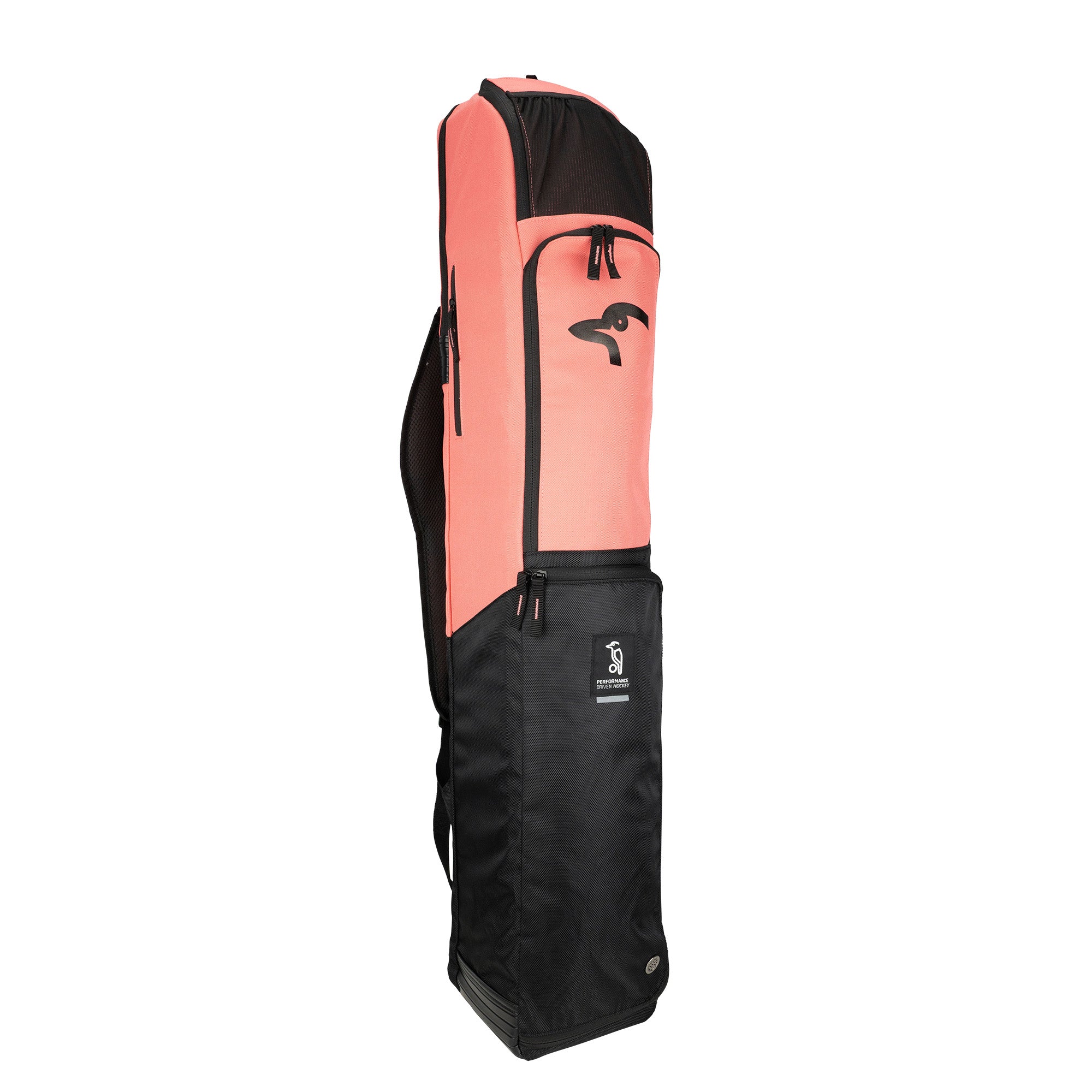 The Kookaburra Forge Hockey Bag 2026 by Kookaburra features a two-tone design with a coral pink upper, black lower section, durable base, multiple zippered compartments, and a black bird profile logo on the front.
