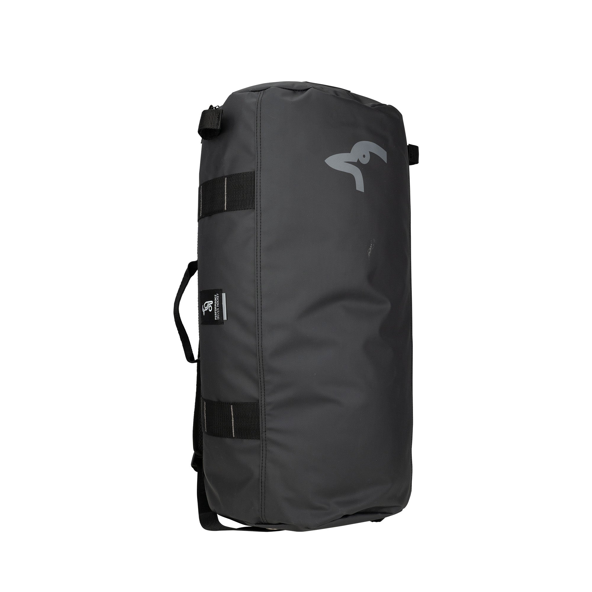 The Kookaburra Pro Switch Holdall by Kookaburra is a black, heavy-duty tarpaulin duffel bag with black side straps, a small white logo at the top, and a fabric tag—ideal for carrying gear or a hockey stick. Stands upright against a white background.