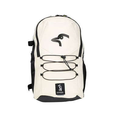 The Kookaburra Edge Rucksack 2026 by Kookaburra features a cream and black design with side panels, front elastic cords, a penguin logo, "PENGUIN PROJECT" patch, ergonomic build, padded laptop sleeve—all set against a white background.