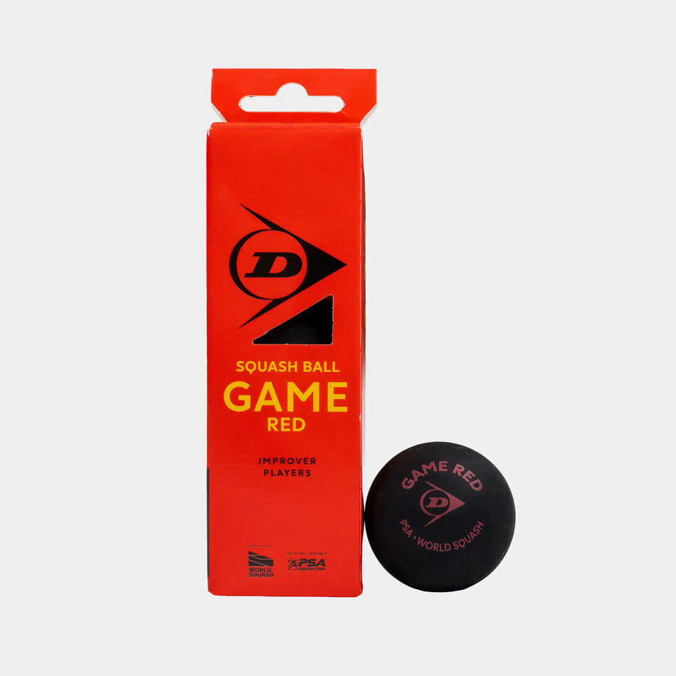 A red box labeled Dunlop Game Red Squash Ball (4 x 3 Ball Box) sits beside a black Dunlop squash ball, ideal for improving players seeking a higher bounce. The packaging displays bold black and yellow text alongside the stylized D logo.