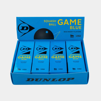 A blue Dunlop box containing four packs of Dunlop Game Blue Squash Ball (4 x 3 Ball Box) features bold yellow and white text on the packaging. This set from Dunlop is perfect as a junior squash ball or beginner squash ball, offering excellent performance for players new to the game.