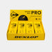 An open yellow Dunlop Pro Squash Ball (4 x 3 Ball Box) is shown, revealing four individual yellow packages inside—each containing low bounce squash balls for advanced players and featuring bold black Dunlop branding and text.