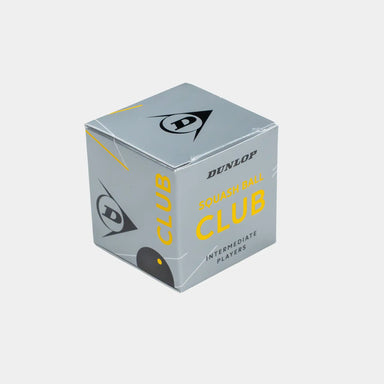 A grey box of Dunlop Club Squash Ball (12 x 1 Ball Box), designed for intermediate players, featuring black and yellow text and graphics on the packaging. Ideal as a club squash ball from Dunlop, it’s a popular choice for league matches.