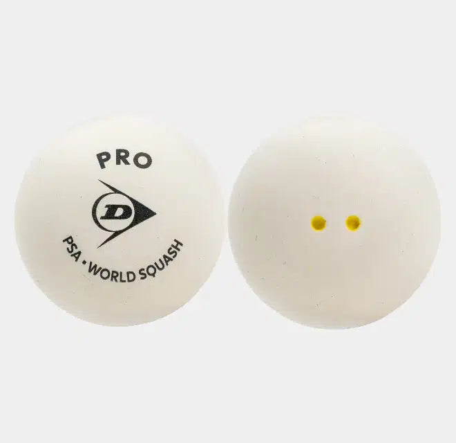Two white squash balls from Dunlop’s Pro White Squash Ball (12 x 1 Ball Box) are shown. One features the Dunlop PRO PSA World Squash logo, while the other displays two small yellow dots, indicating it is a low bounce option. Both balls are placed against a plain white background, making them ideal for professional glass court play.