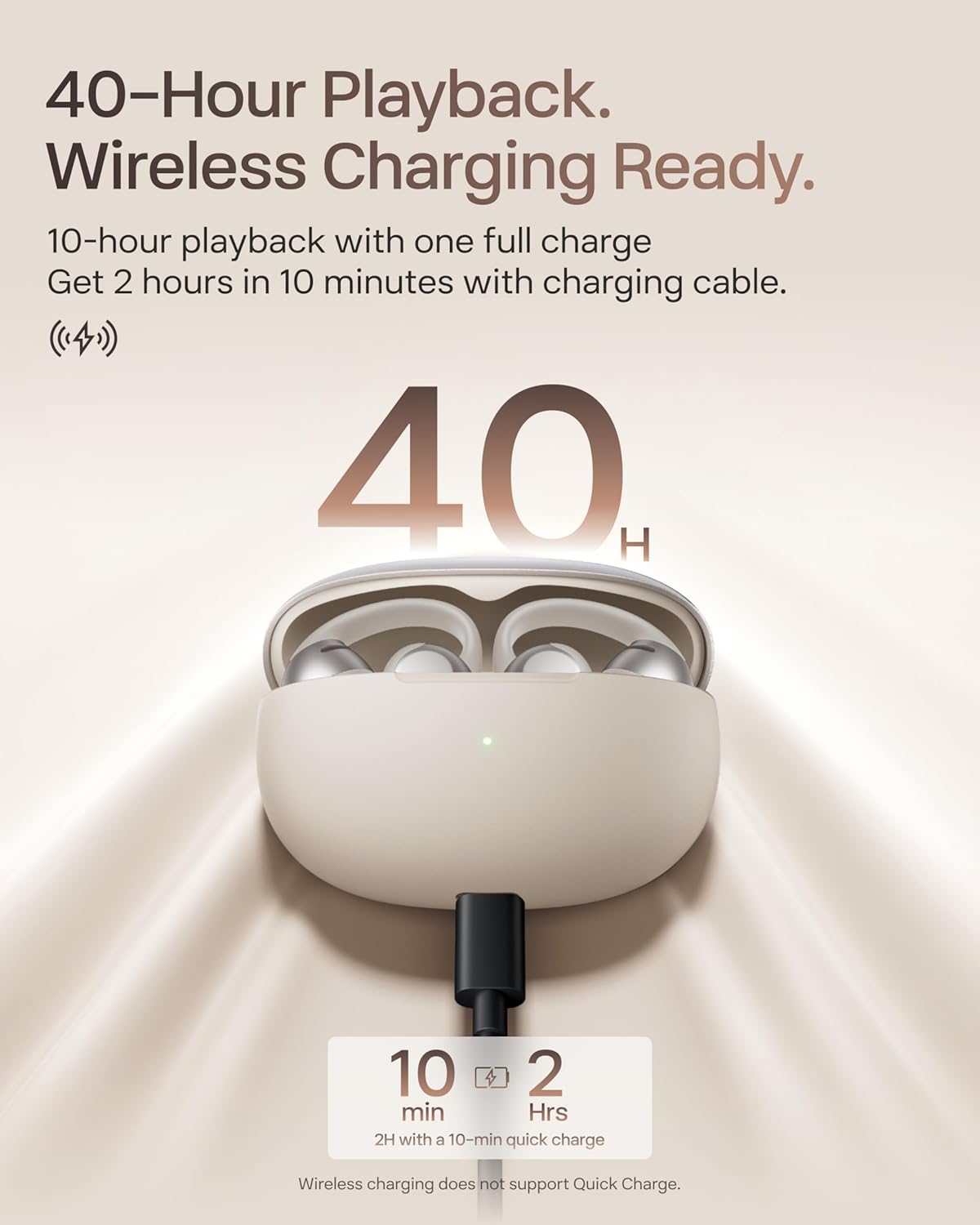 The Shokz OpenDots One by Shokz are beige open-ear earbuds in a charging case with a cable plugged in. Enjoy up to 40-hour playback, 10 hours per charge, and fast charging—2 hours of use after just 10 minutes. Immersive audio all day.