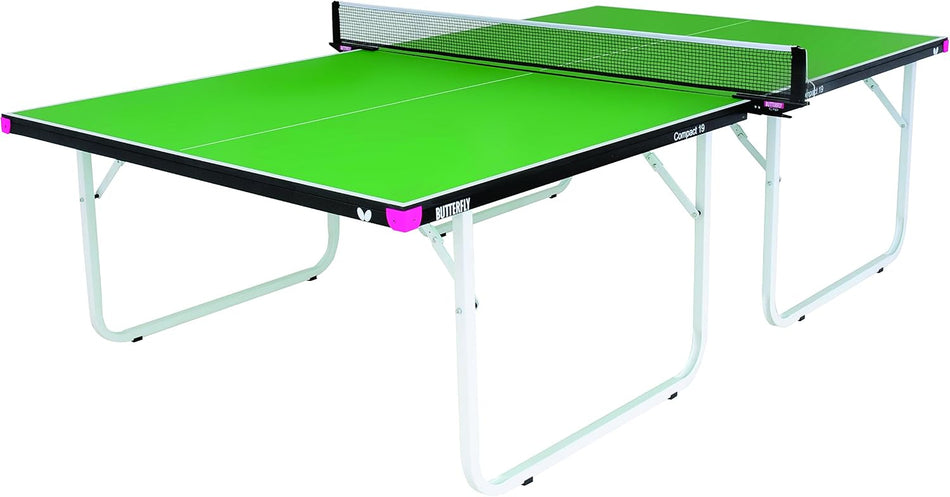 A green Butterfly Compact 19 Wheelaway Table Tennis table by Butterfly, featuring white folding legs, a centrally attached net, and distinctive small pink corner sections that highlight its sleek design.