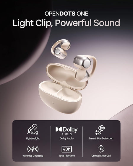 Beige Shokz OpenDots One open-ear earbuds and charging case shown with text highlighting lightweight design, immersive audio, smart side detection, wireless charging, 40h playtime, and crystal-clear calls.