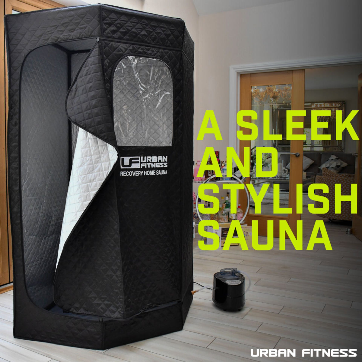 An Urban Fitness Recovery Home Sauna in black is set up in a living room. Neon yellow text says, "A sleek and stylish sauna." The external heating unit offers convenient heat therapy at home.